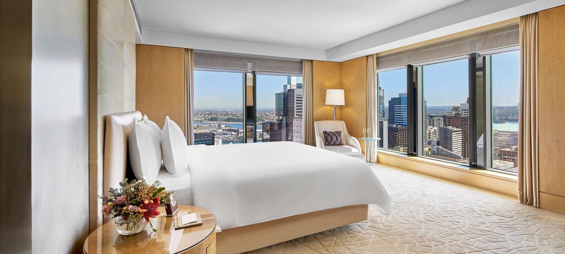 King bed & city view in Executive Suite at Fullerton Sydney