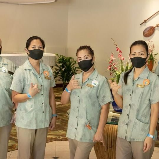 Spa staff posing in the Spa lobby area at Waikiki Resort Hotel by Sono
