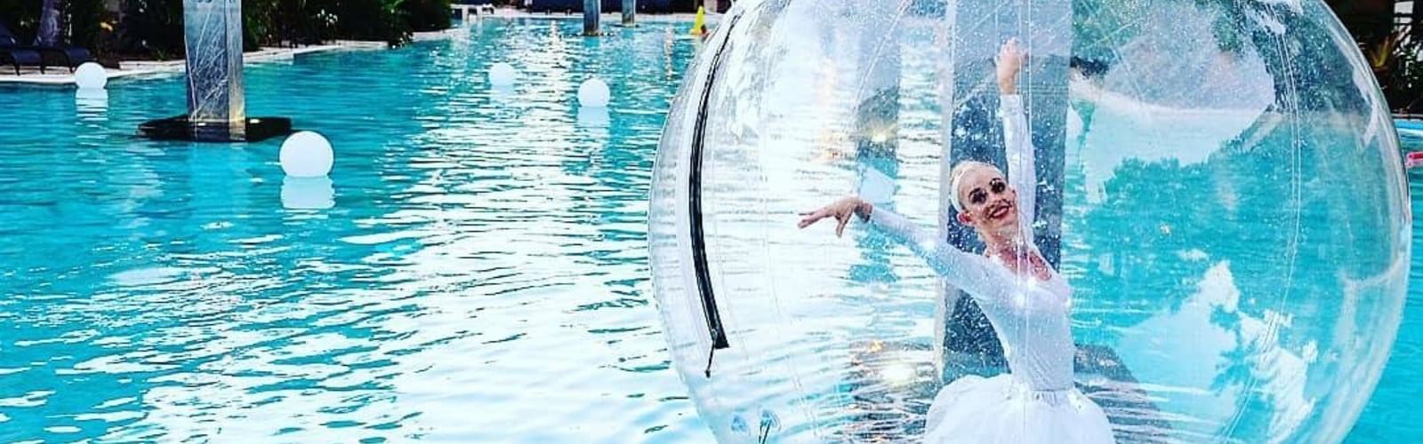 A girl zorbing at  Pullman port douglas sea temple resort and spa