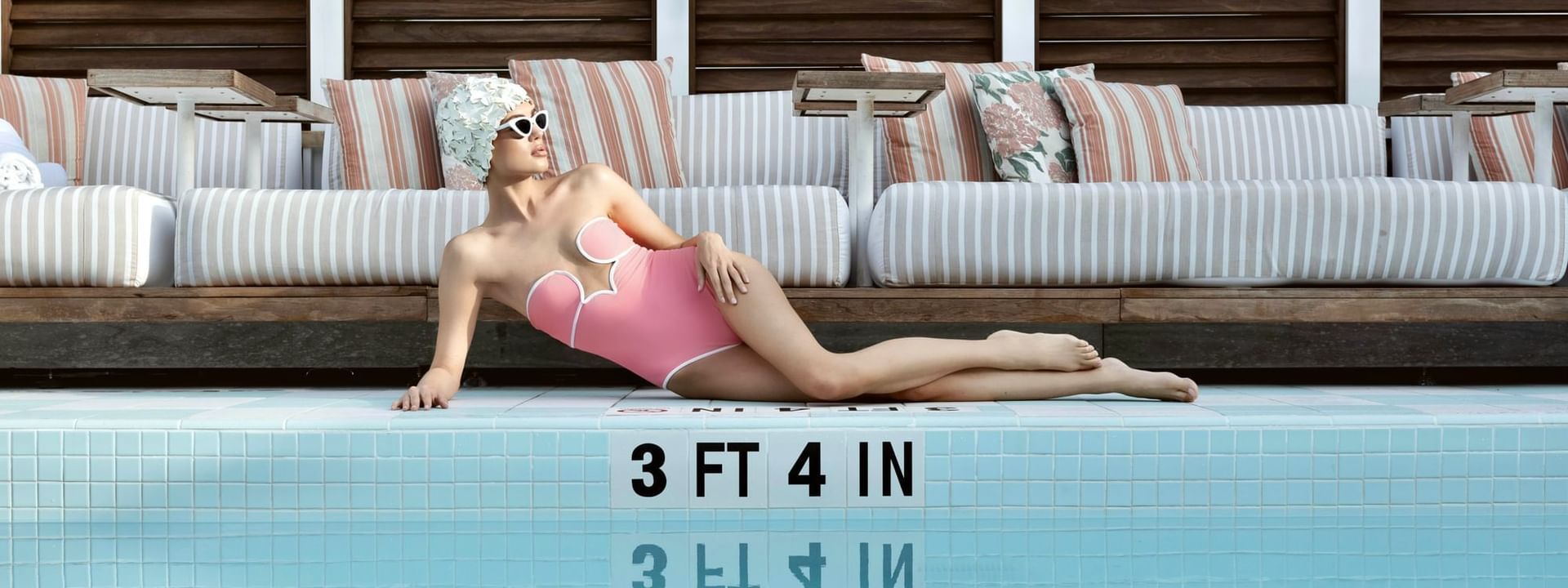 Nic del Mar posing with monokini near pool at Esme Miami Beach