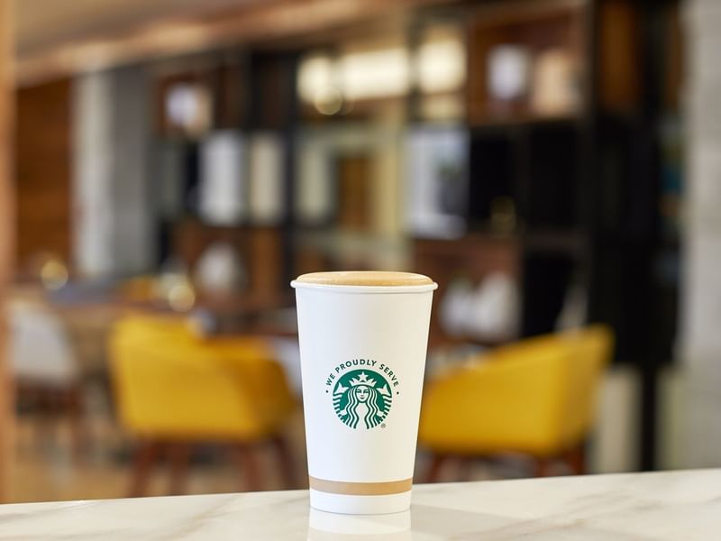 Starbucks Coffee cup at a Coffee shop in La Colección Resorts