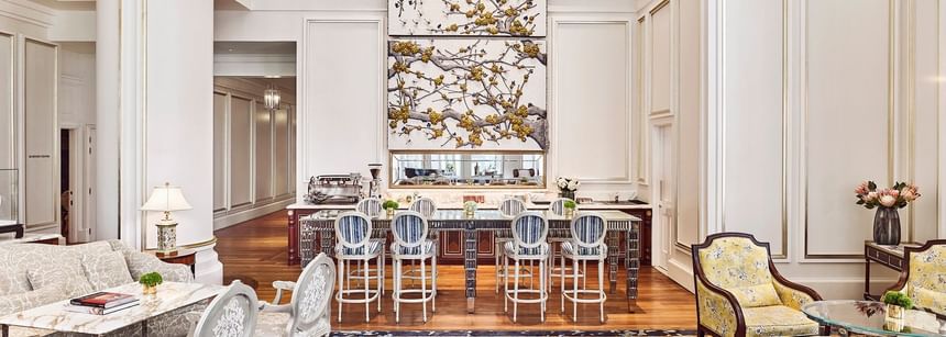 Park Lounge with high ceilings, a floral art piece, stylish bar seating, and chic furnishings at Park Hyatt Saigon