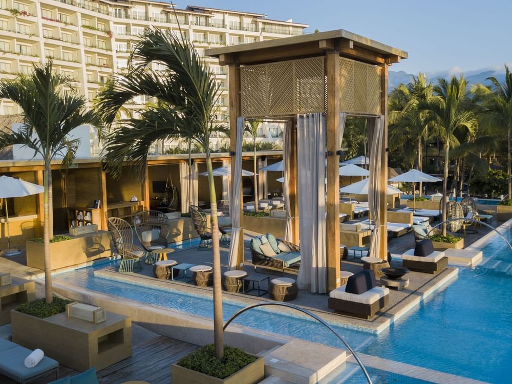 Pool with pool beds at Fiesta Americana Hotels