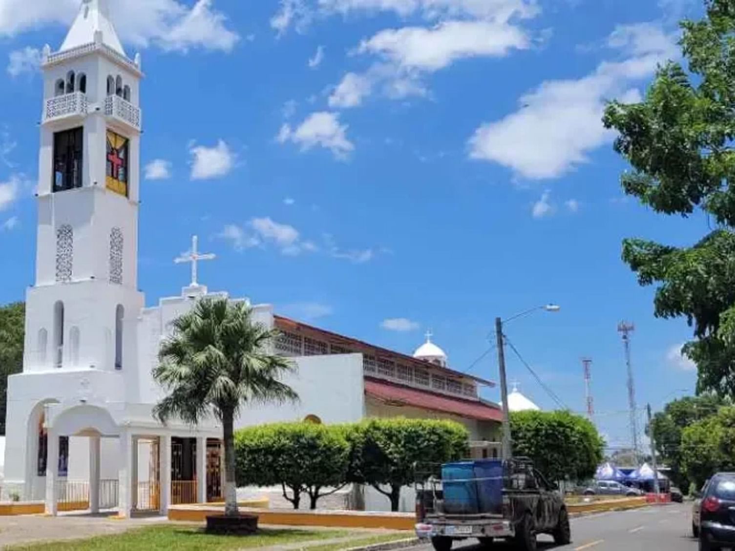 Church with a tall bell tower at Alanje near Las Olas Beach Resort featuring Panama day tours