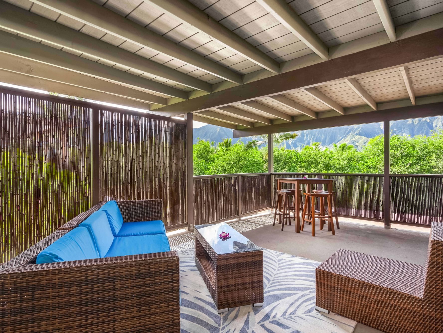 Balcony lounge area in Studio Suite Mountain View at Paradise Bay Resort