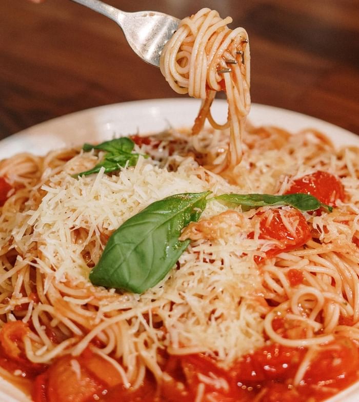 Close-up of a spaghetti dish served in a Restaurant near Anaheim Portofino Inn & Suites