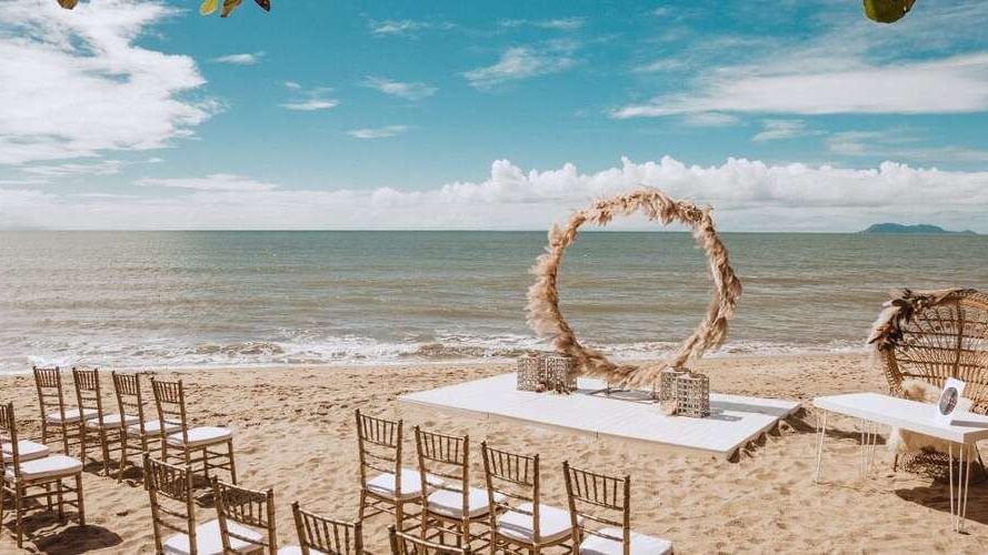 Wedding Ceremony on beach at Pullman Palm Cove