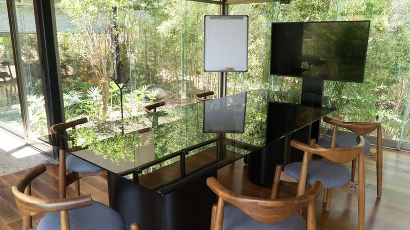 Event room with a TV at Gamma Monterrey Rincón de Santiago