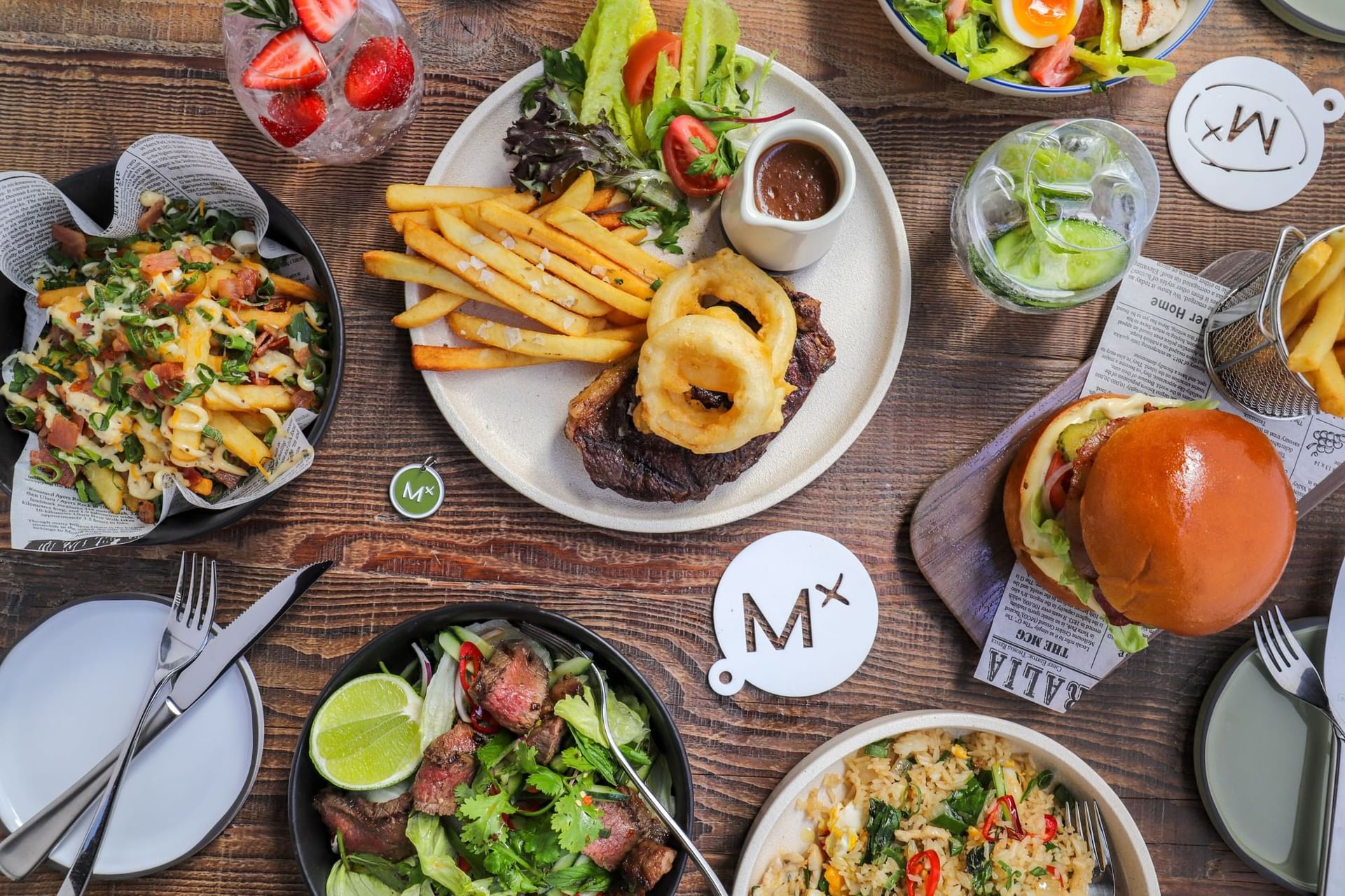 Burgers, Fries, Onion Rings, and Salad at Novotel Sydney International Airport 