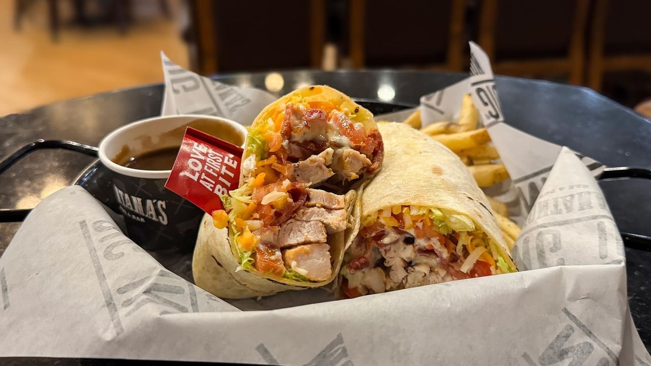 Burritos and fries from The Den Pub.