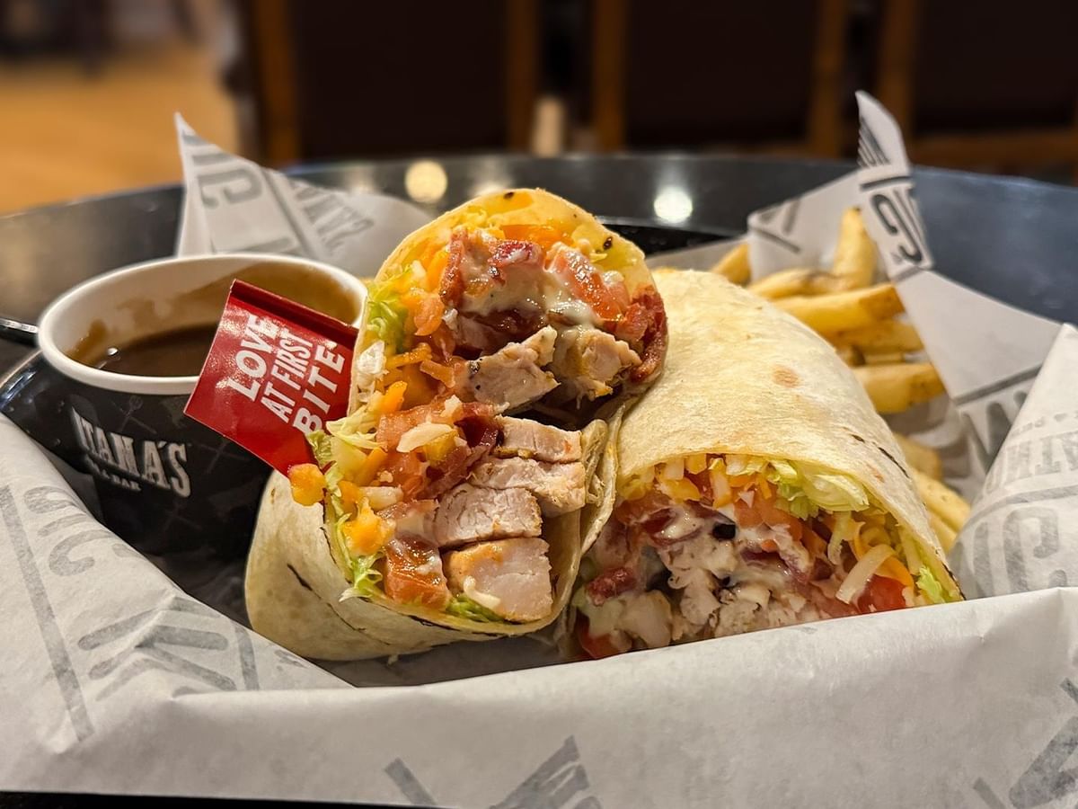 Burritos with fries at The Den Pub