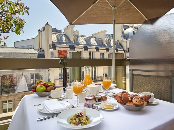 Breakfast served in the terrace at Warwick Paris Champs Elysées