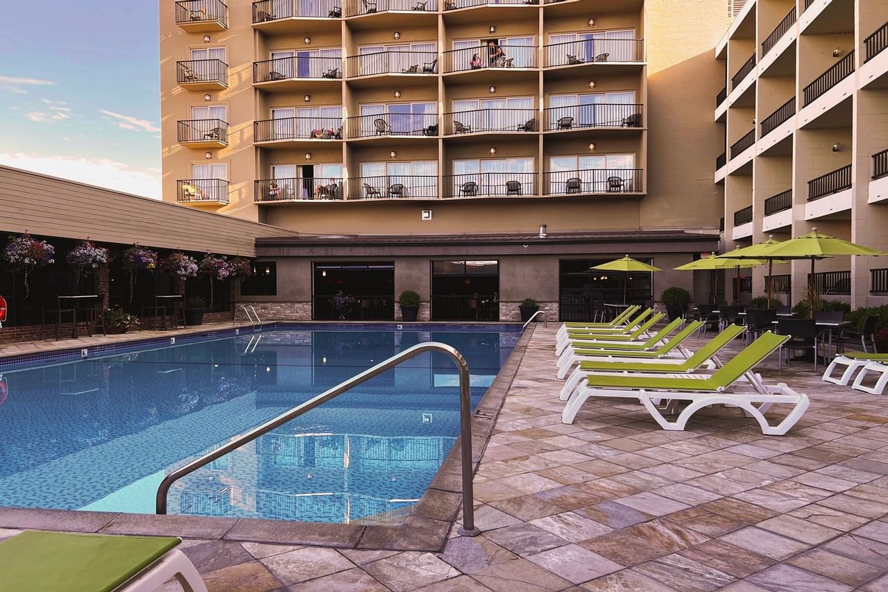 Swimming pool with sun loungers