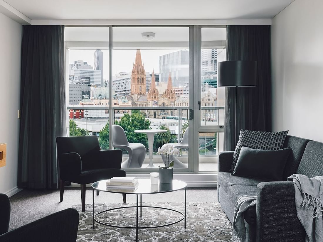 Livingroom area in 2 Bedroom 2 Bathroom Deluxe Apartment with City & River Views at Quay West Suites Melbourne