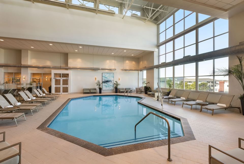 Close-up of the indoor pool & lounges at Holiday Inn Hotel