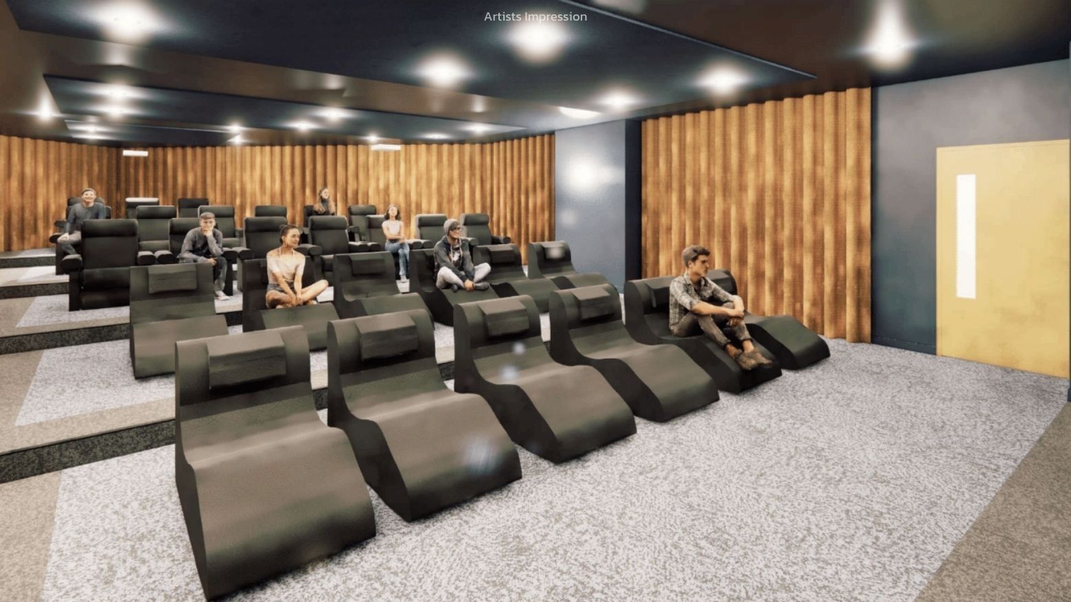 Comfortable lounge chairs in a cozy theater-style seating area at UniLodge Brisbane City.