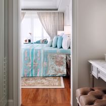 Interior of Premier Bedroom with a king bed at Palazzo Versace