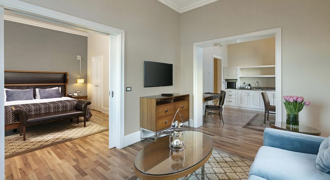 Wooden carpeted floors, spacious living room with cozy loungers in Premier Suite at Titanic Business Kartal