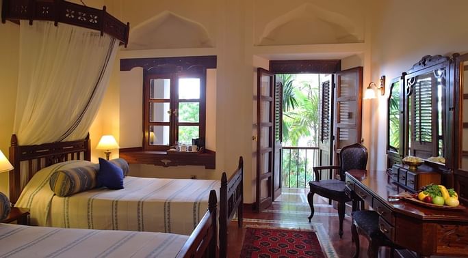 Twin beds in the Standard Room at Zanzibar Serena Hotel