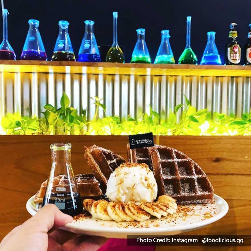 A plate of waffles and ice cream at Caffeine Chemistry Coffee cafe - Lexis Suites Penang