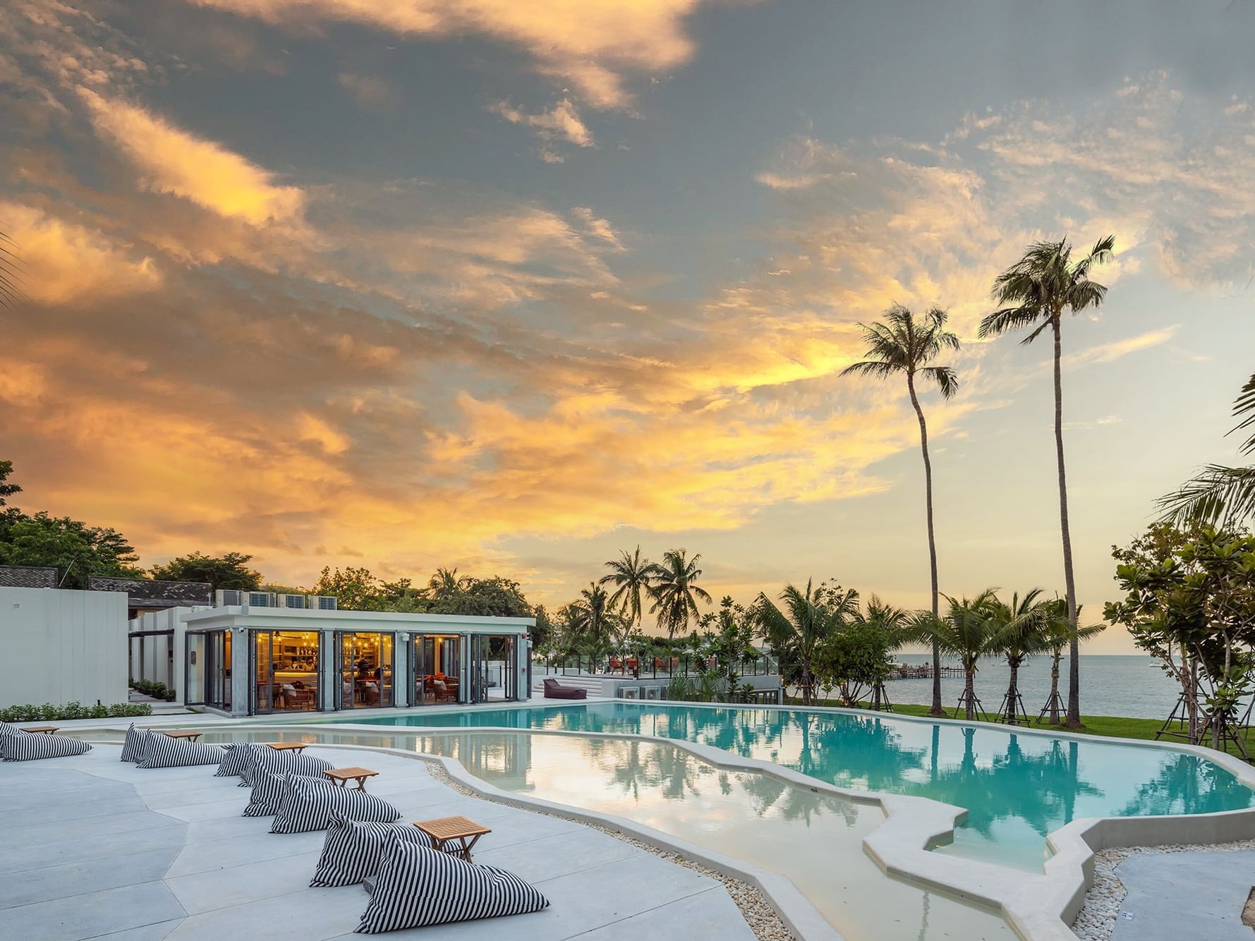 View of the sunset from pool side at U Hotels & Resorts