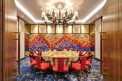 Private dining table arrangement with colorful interior in Zuan Yuan Chinese Restaurant at One World Hotel