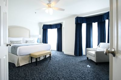 King bed in Premier Suite with Balcony at The Horton Grand
