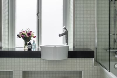 Bathroom vanity area in Junior Suite at The Sparrow Hotel