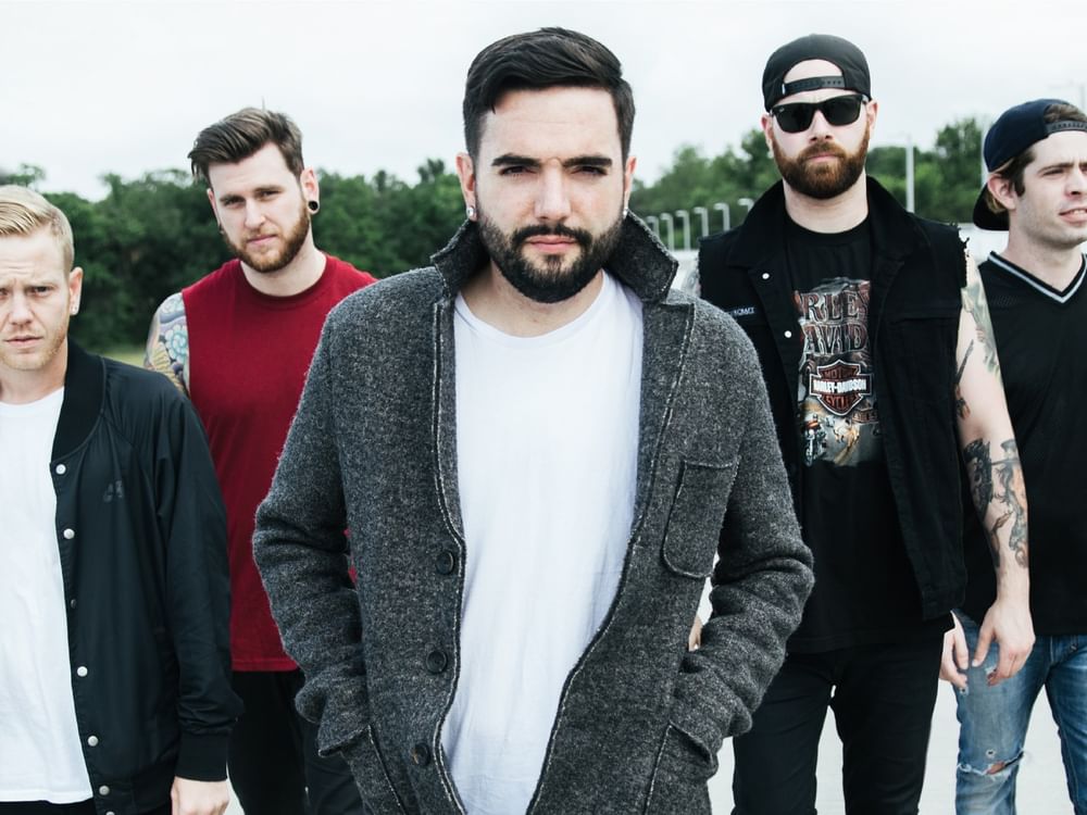 Five band members of A Day to Remember and Papa Roach for the Big Rock Tour 2026.