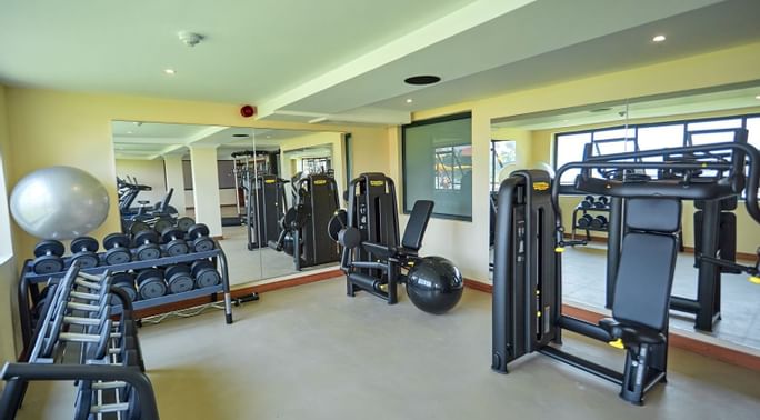 Fitness center with equipment in the hotel at Goma Serena Hotel