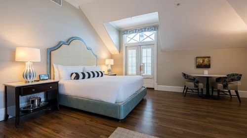 Spacious suite with hardwood floors and a king bed at The Pearl Hotel in Rosemary Beach.