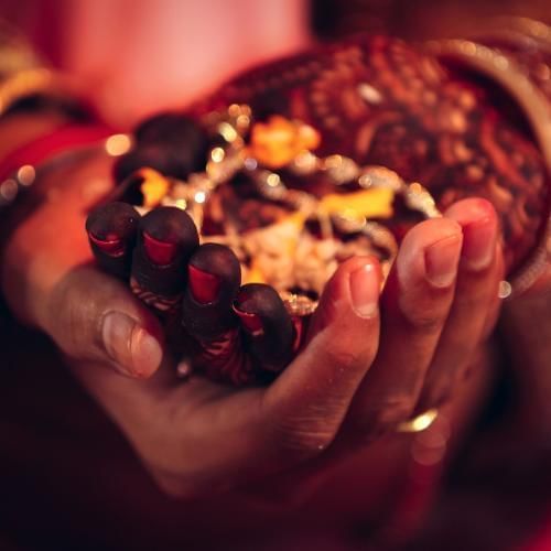 Bride with gifts in her hands Pakistani wedding traditions
