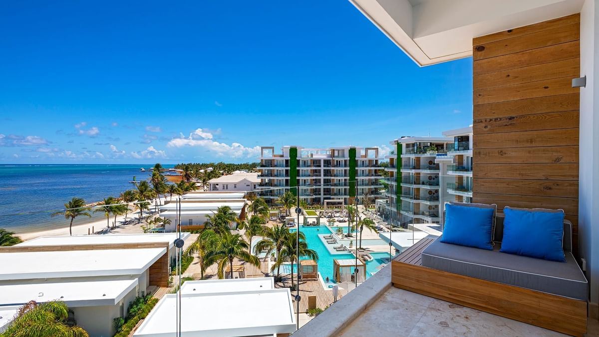 Outdoor balcony area in Oceanview Vista One Bedroom Suite at Alaia Belize Autograph Collection