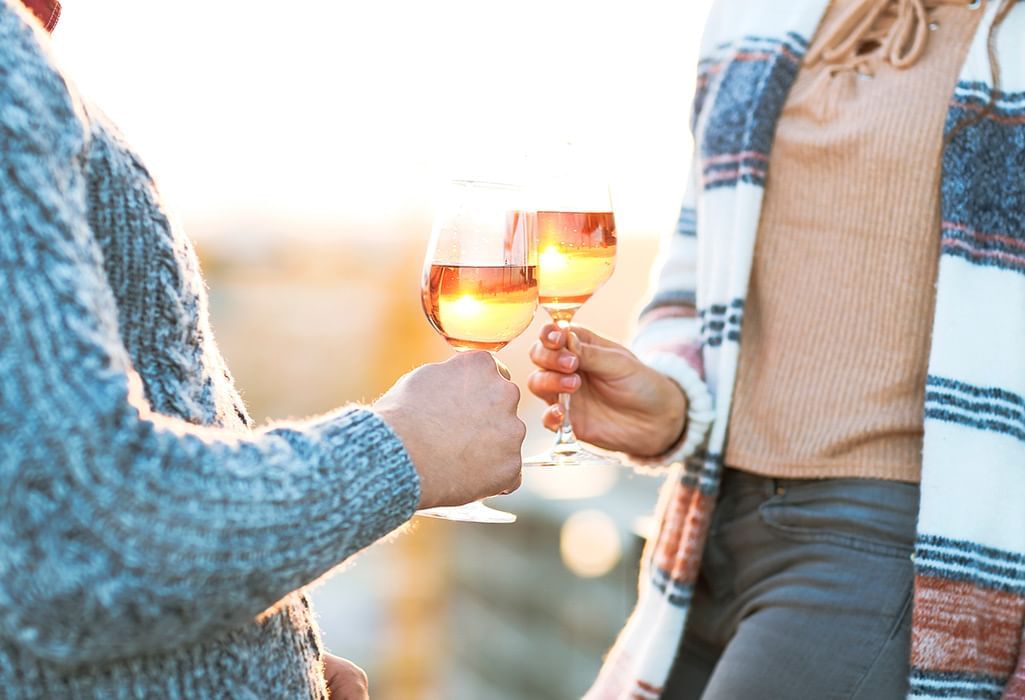 Two Girls holding wine glasses