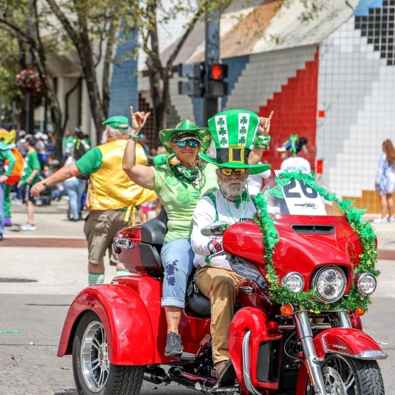 Two Men on a Motorcycle at the St Patricks Parade on Las Olas Blvd. 