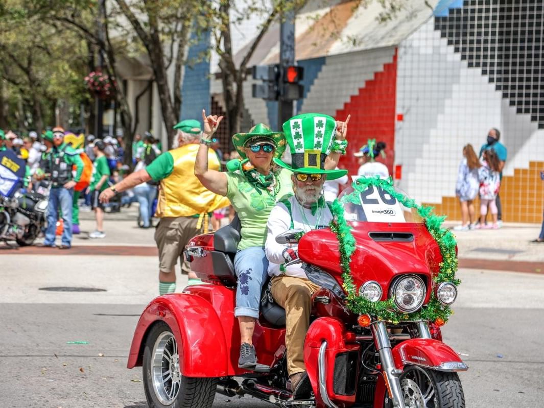 Two Men on a Motorcycle at the St Patricks Parade on Las Olas Blvd. 