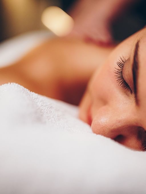 Closeup on a woman laying in spa at May Fair Hotel London