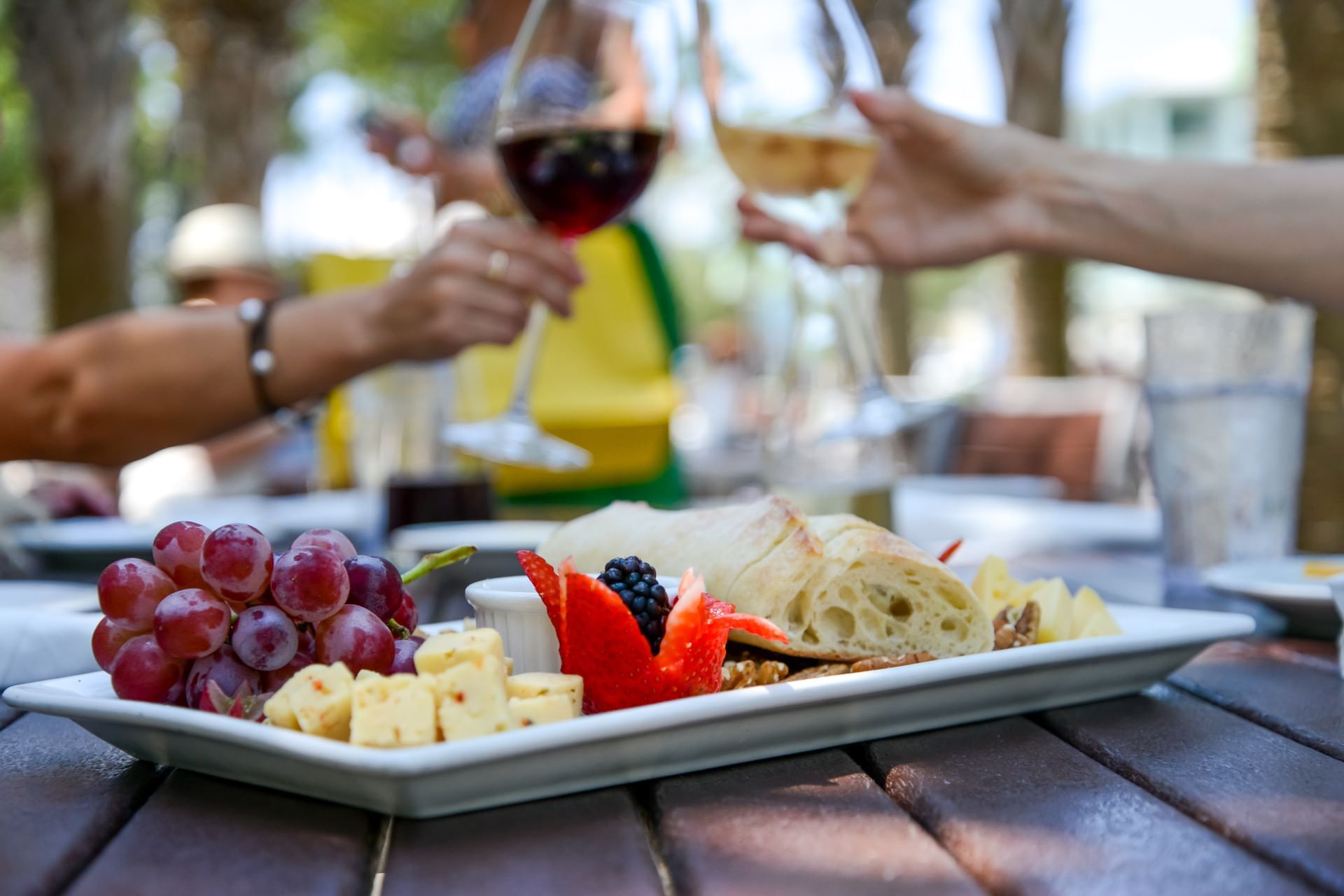 Closeup of a dish & wine served at The lodge 30A