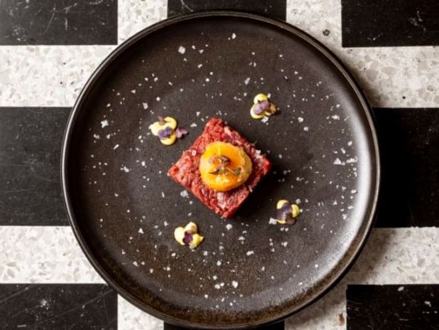 Fine dish served in EMME Restaurant at Rome Luxury Suites