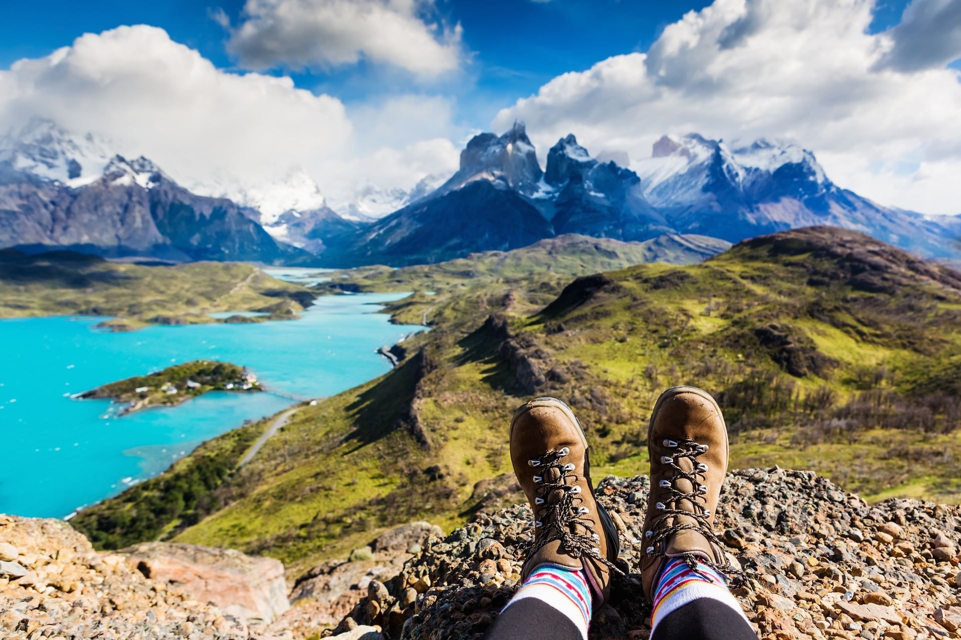 Girl hiking boots enjoying mountain view near Hotel Cabo