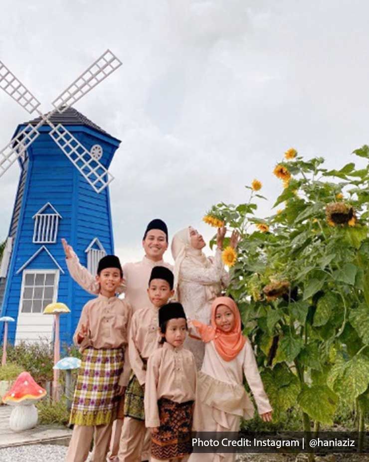 A family were taking a picture at Sunflower Garden - Lexis Suites Penang