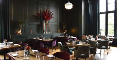 Dining table setup in restaurant at Easthampstead Park Hotel