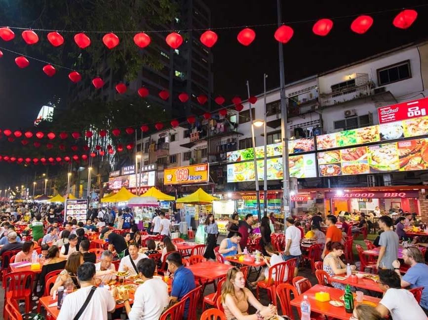 Bukit Bintang nightlife with eateries in crowded Jalan Alor near Imperial Lexis Kuala Lumpur