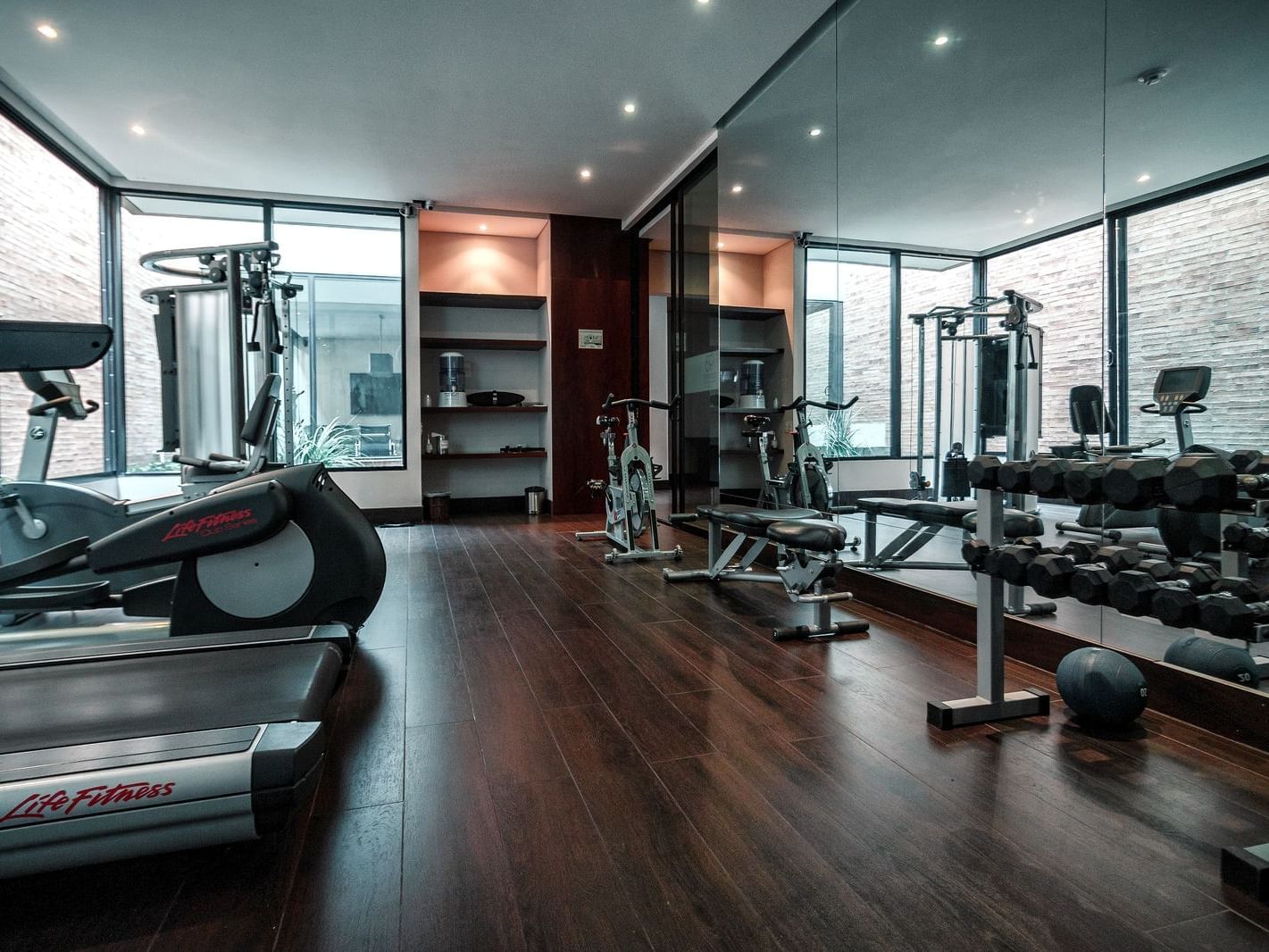 Exercise machines in the fitness center at Blue Doors Hotels