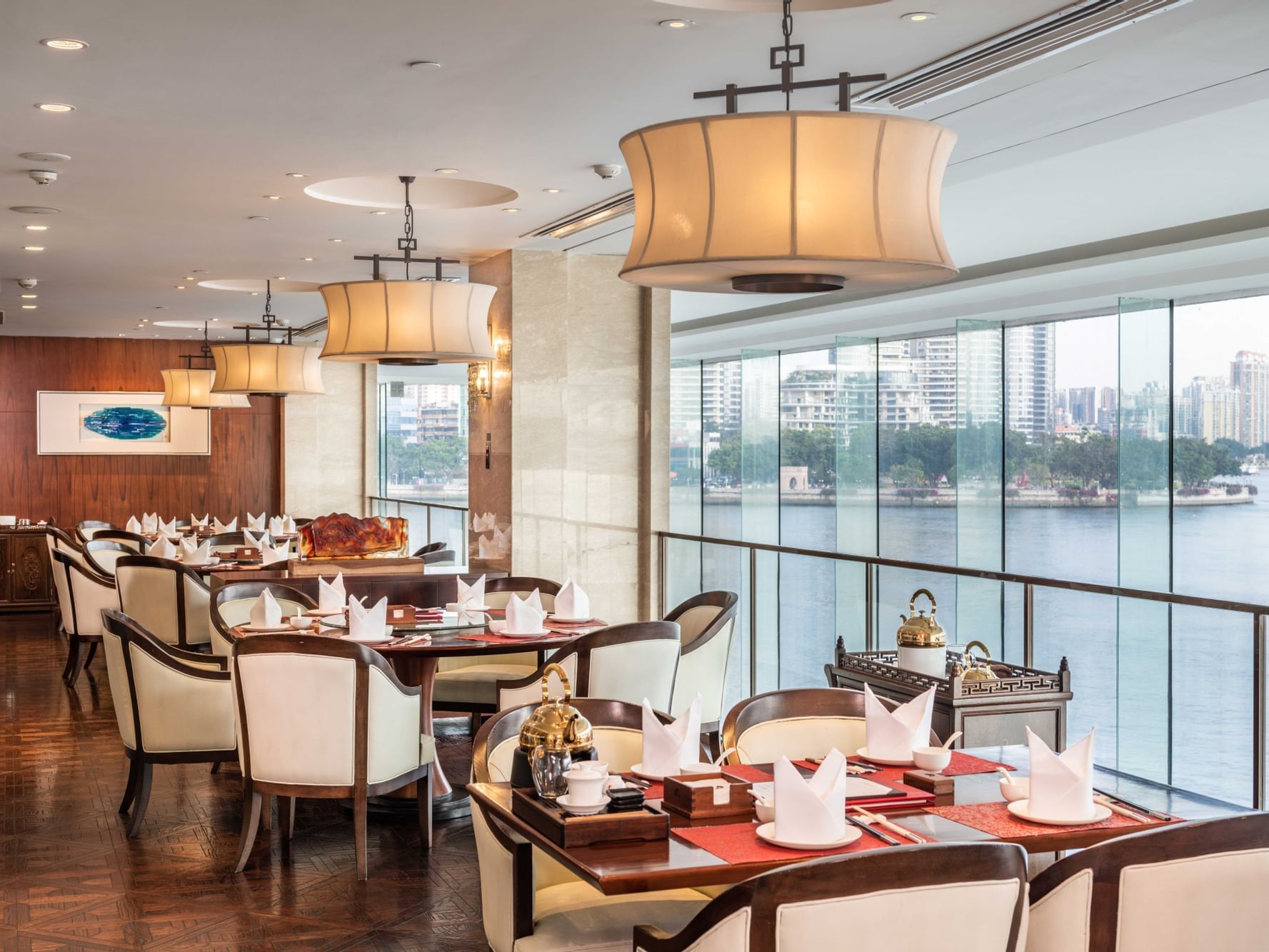 Tables in Flavors of China with a city view at White Swan Hotel