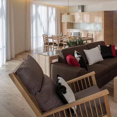 Living area in Residence Deluxe Room at Falkensteiner Hotels