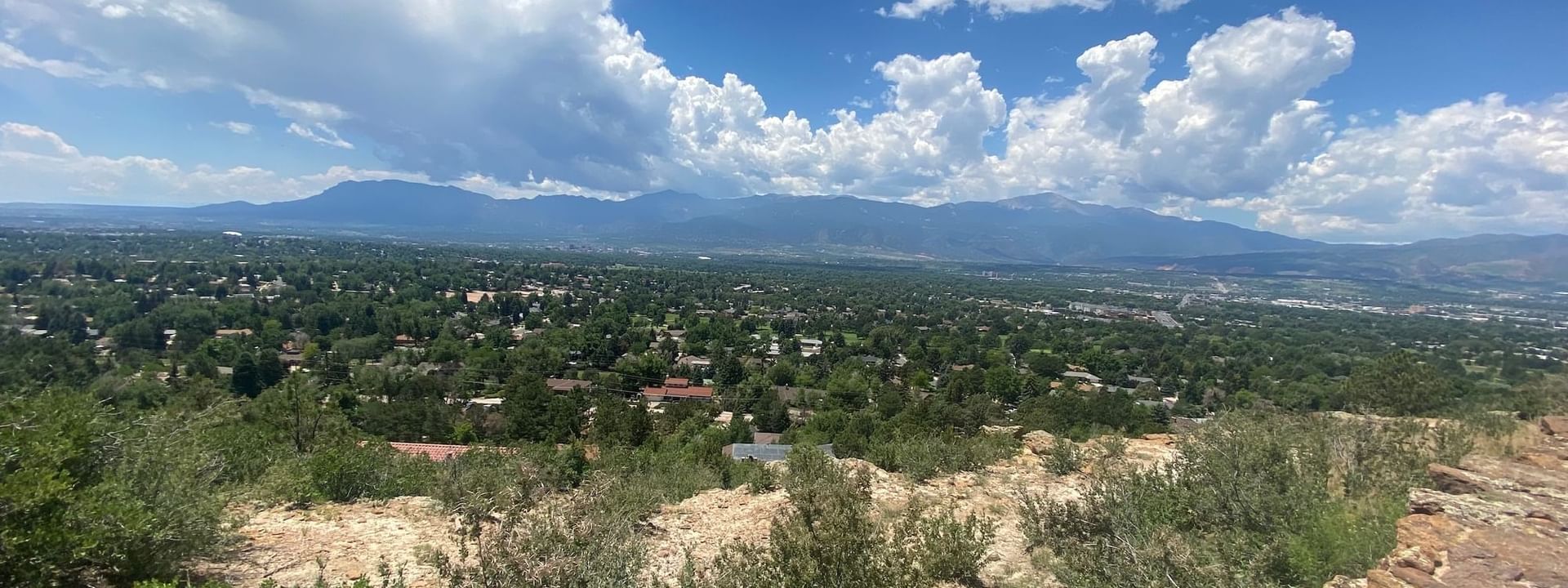 Distant view of the city from the Palmer Park on a sunny day near Kinship Landing
