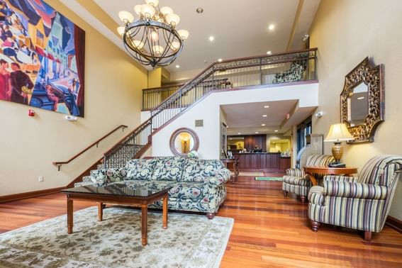 Spacious lobby lounge area with cozy chairs at The Wildwood Hotel