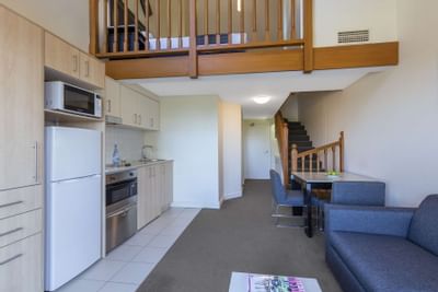 Fully furnished room with upstairs at Nesuto Hotels