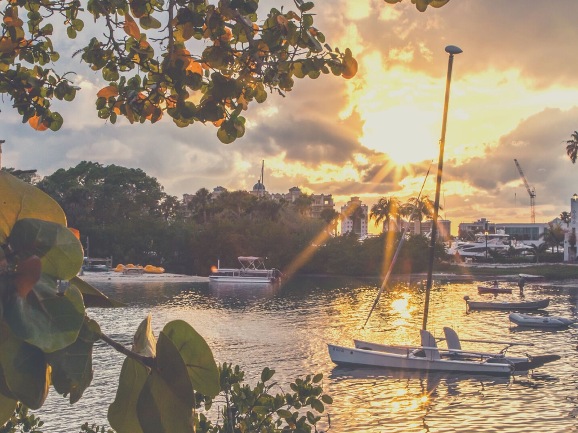 View of boats stationed on a river near The Sarasota Modern